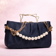 Elegant handbag with pearls and gold chain
